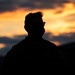 C130J Hercules crew debark at sunset