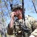 1st Brigade Combat Team 82nd Airborne Division Soldier make call on field radio in pine forest during training