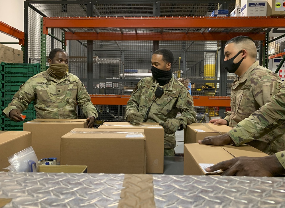 Soldiers and Airmen Assemble Care Packages