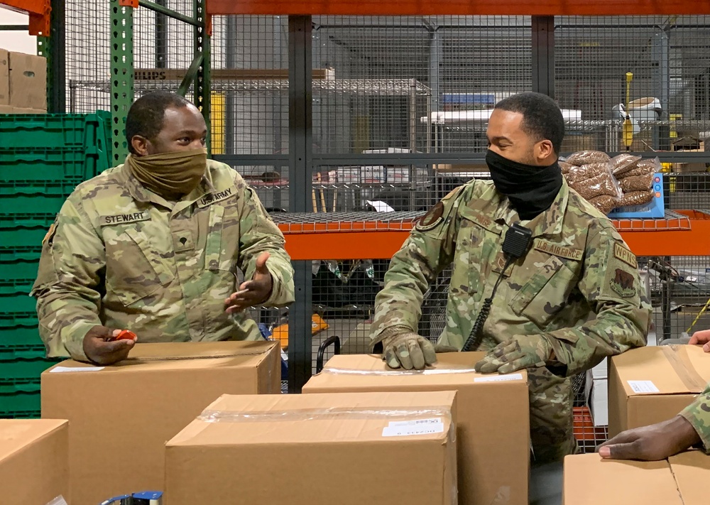 Soldiers and Airmen Assemble Care Packages