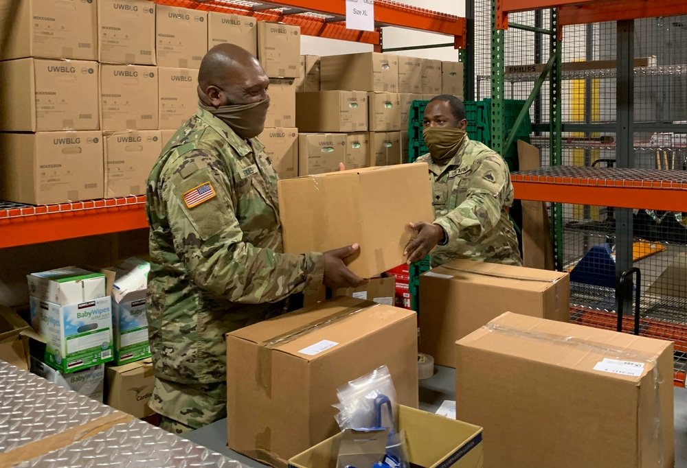 Soldiers and Airmen Assemble Care Packages