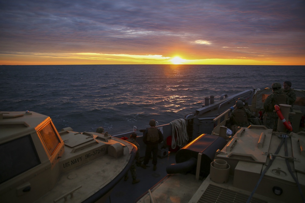 Sunrise, Sailors and Sand