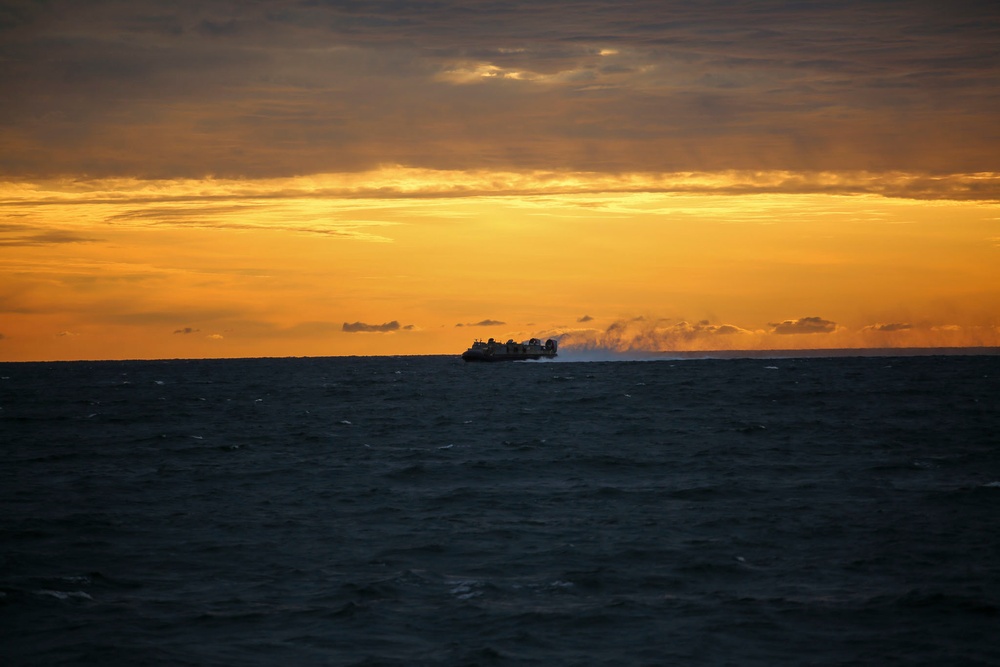 Sunrise, Sailors and Sand
