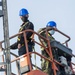 Sailors Install a Wind Bird Aloft