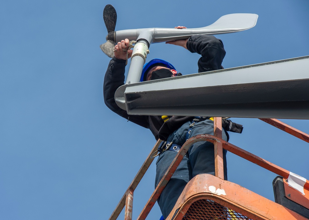 Sailors Install a Wind Bird Aloft