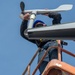 Sailors Install a Wind Bird Aloft