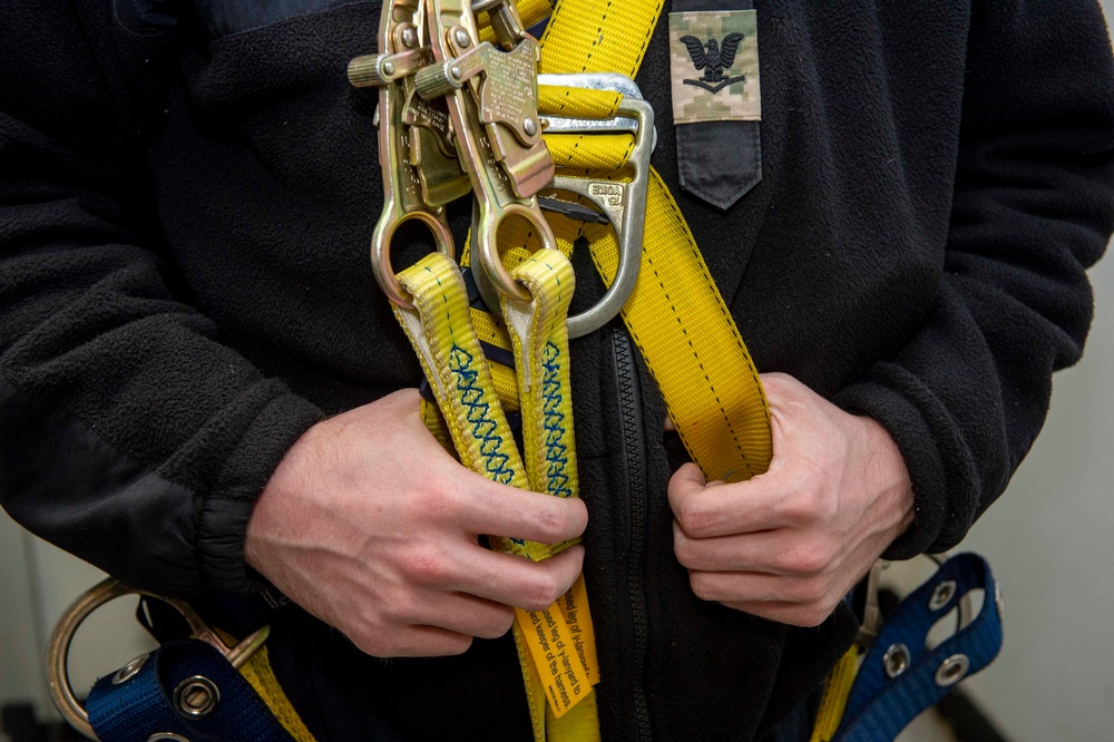 Sailors Install a Wind Bird Aloft