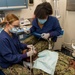 Saliors perform dental cleaning