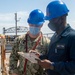 Sailors Conduct Mainentance On Flight Deck