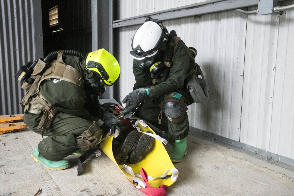 U.S. Marines and Sailors with Chemical Biological Incident Response Force (CBIRF) participate in the final training event during CBIRF Basic Operations Course (CBOC)