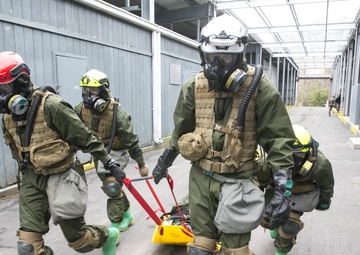 U.S. Marines and Sailors with Chemical Biological Incident Response Force (CBIRF) participate in the final training event during CBIRF Basic Operations Course (CBOC)