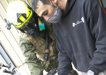 U.S. Marines and Sailors with Chemical Biological Incident Response Force (CBIRF) participate in the final training event during CBIRF Basic Operations Course (CBOC)