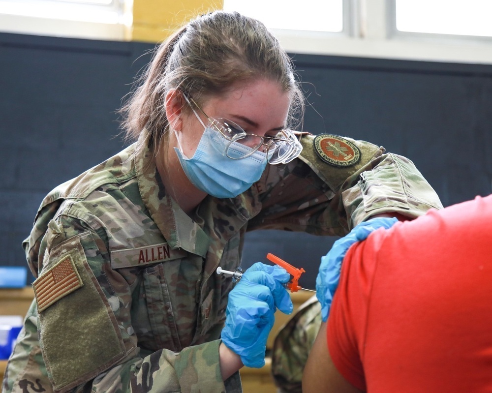 U.S. Air Force Airmen aid FEMA in administering COVID-19 vaccine at Medgar Evers College CVC