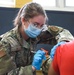 U.S. Air Force Airmen aid FEMA in administering COVID-19 vaccine at Medgar Evers College CVC