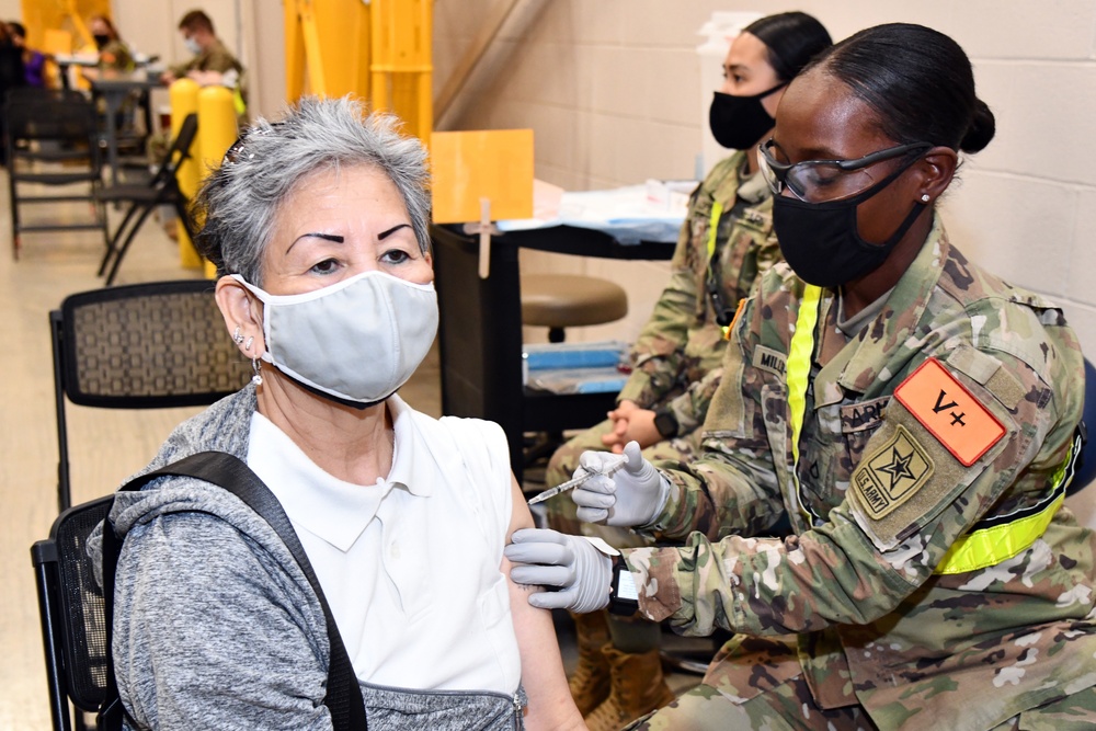 MEDCoE Soldiers administer COVID-19 vaccines, helping to win the pandemic war