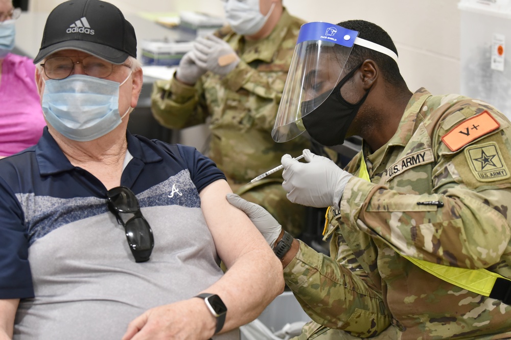 MEDCoE Soldiers administer COVID-19 vaccines, helping to win the pandemic war