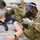 MEDCoE Soldiers administer COVID-19 vaccines, helping to win the pandemic war