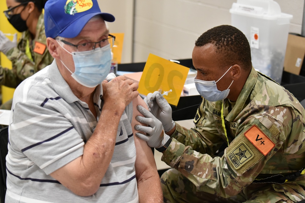 MEDCoE Soldiers administer COVID-19 vaccines, helping to win the pandemic war