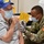 MEDCoE Soldiers administer COVID-19 vaccines, helping to win the pandemic war
