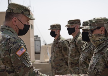 U.S. Transportation Command commander recognizes 386 AEW Airmen