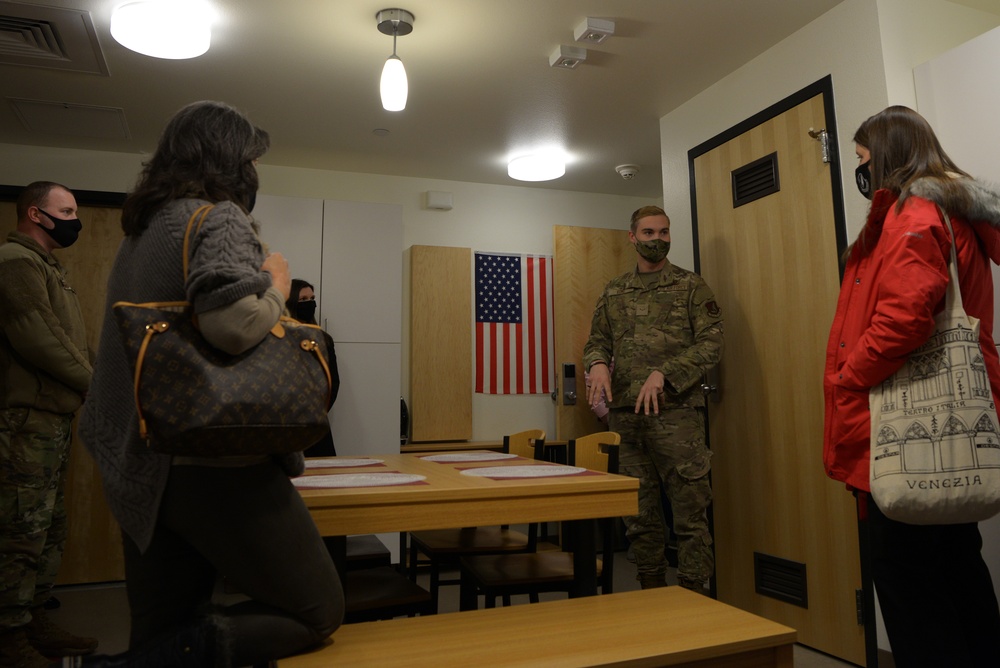 Lt. Gen. David Krumm, Chief Master Sgt. Kristopher Berg and their spouses visit Eielson AFB