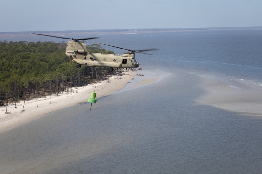 3rd Combat Aviation Brigade works with the U.S. Coast Guard to recover displaced buoys.
