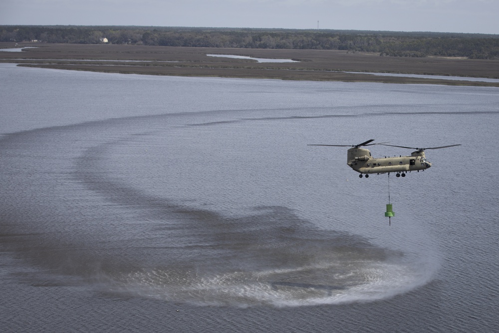 3rd Combat Aviation Brigade works with the U.S. Coast Guard to recover displaced buoys.