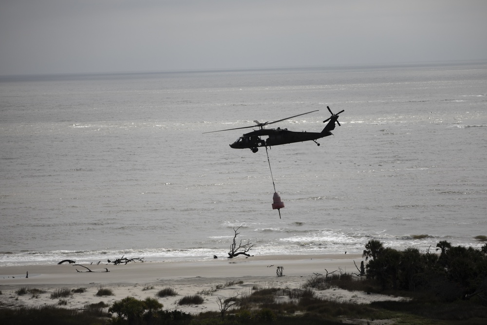 3rd Combat Aviation Brigade works with the U.S. Coast Guard to recover displaced buoys.