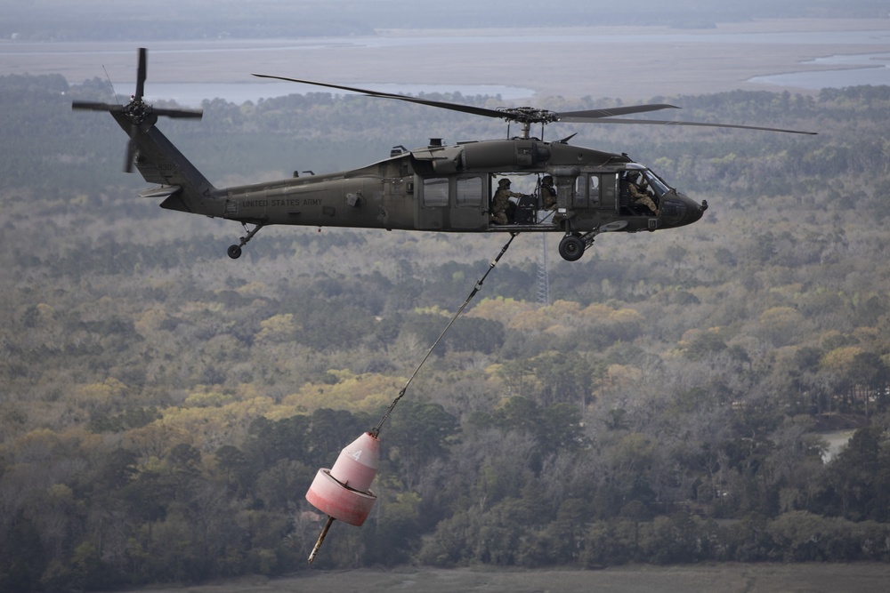 3rd Combat Aviation Brigade works with the U.S. Coast Guard to recover displaced buoys.