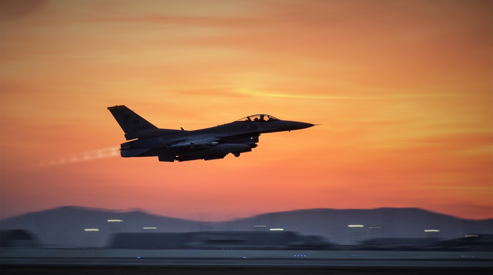 Wolf Pack F-16s take off at dawn