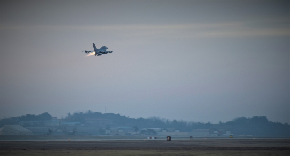 Wolf Pack F-16s take off at dawn