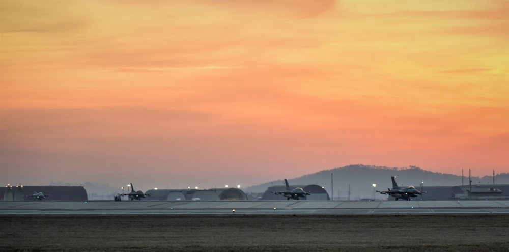 Wolf Pack F-16s take off at dawn