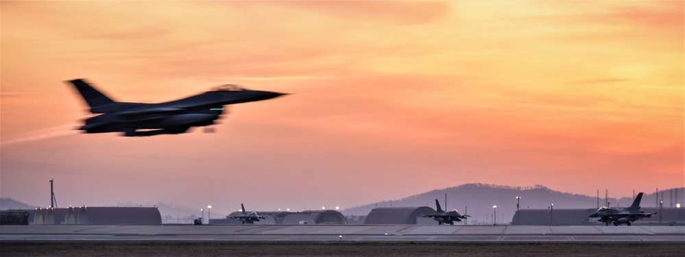 Wolf Pack F-16s take off at dawn