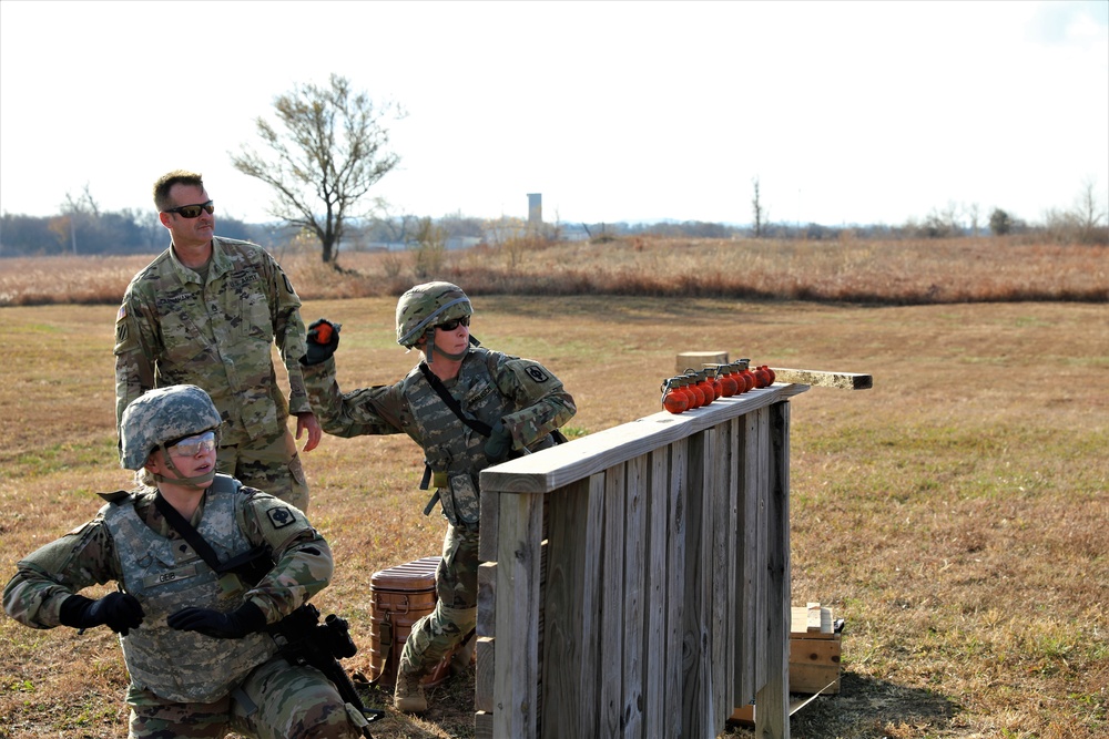 Soldiers of the130th Field Artillery Brigade trains at the hand grenade simulation range