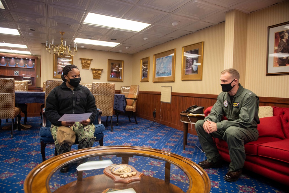 CO. presents award to a Sailor