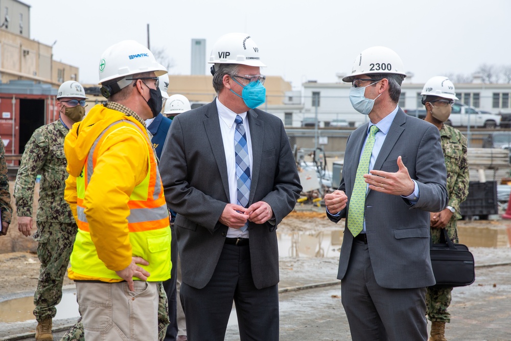 Acting Secretary of the Navy Thomas W. Harker speaks with Nuclear Engineering and Planning Manager Jeremy Largey during his visit to Norfolk Naval Shipyard March 17