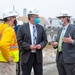 Acting Secretary of the Navy Thomas W. Harker speaks with Nuclear Engineering and Planning Manager Jeremy Largey during his visit to Norfolk Naval Shipyard March 17