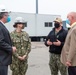 Acting Secretary of the Navy Thomas W. Harker stops at Dry Dock 4 during his visit to Norfolk Naval Shipyard March 17