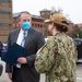 Acting Secretary of the Navy Thomas W. Harker is presented a memento by Shipyard Commander Capt. Dianna Wolfson at the conclusion of his visit to Norfolk Naval Shipyard March 17