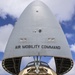 Marines, airmen load helicopters into Super Galaxy for deployment