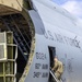 Marines, airmen load helicopters into Super Galaxy for deployment