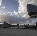 Marines, airmen load helicopters into Super Galaxy for deployment