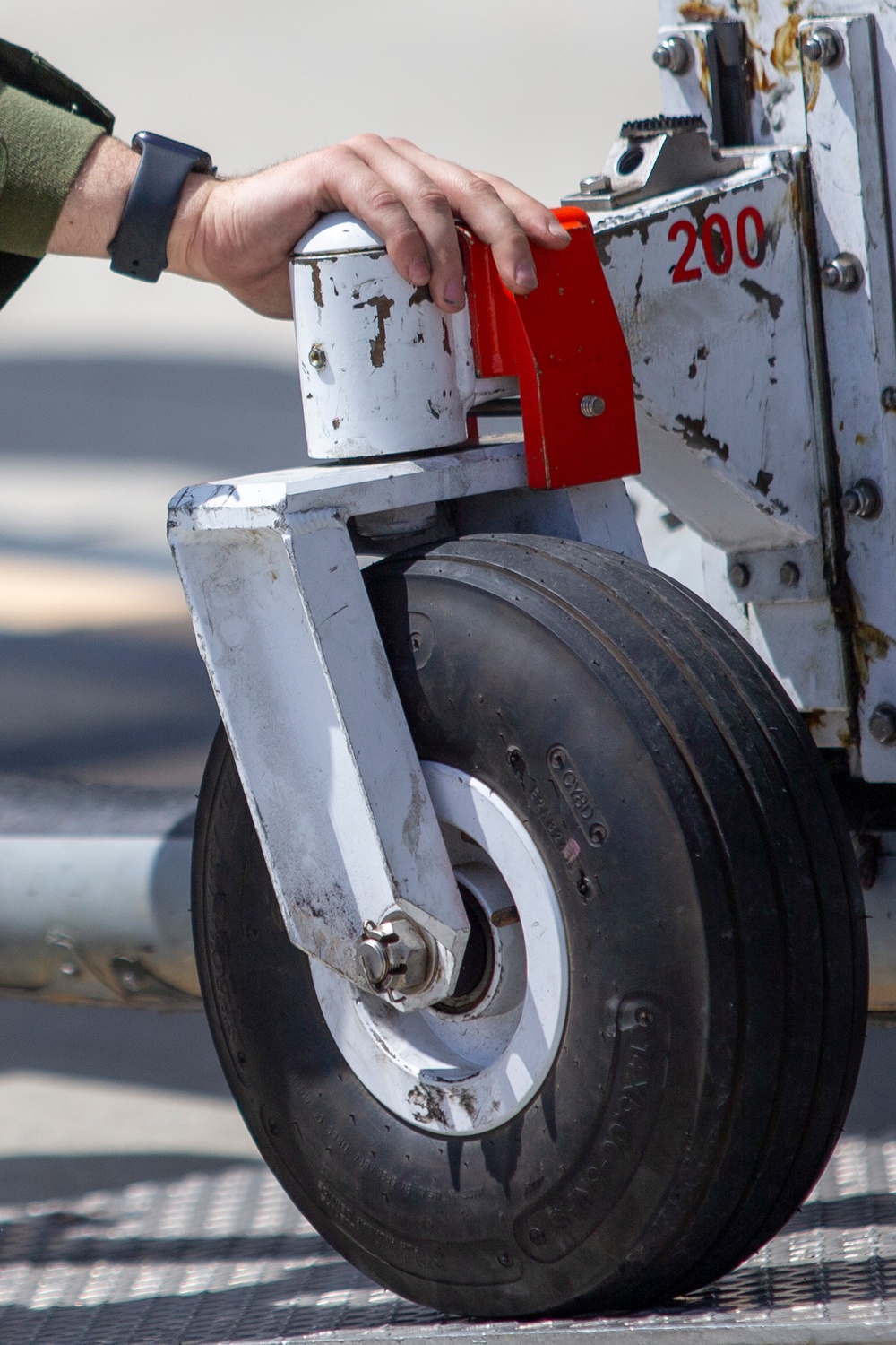Marines, airmen load helicopters into Super Galaxy for deployment