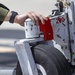 Marines, airmen load helicopters into Super Galaxy for deployment
