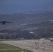 Marines, airmen load helicopters into Super Galaxy for deployment