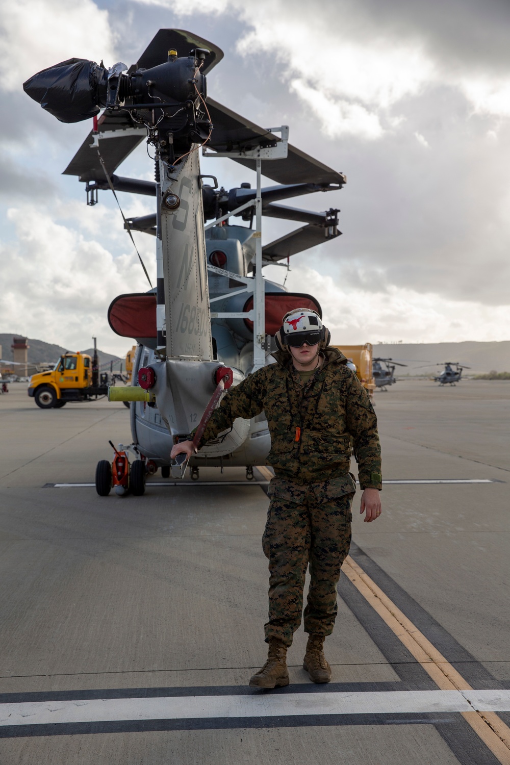 Marines, airmen load helicopters into Super Galaxy for deployment