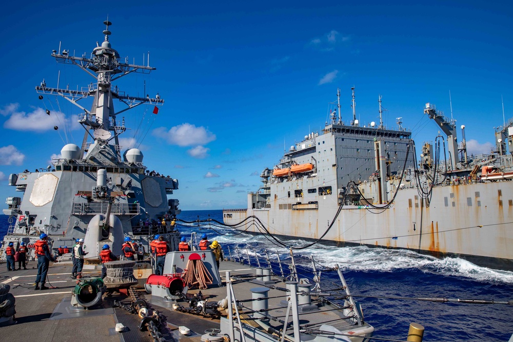 USS Barry conducts a replenishment-at-sea with USNS Amelia Earhart