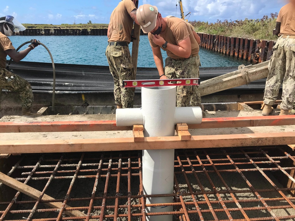 NMCB 4 repairs the Tinian Harbor