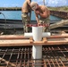 NMCB 4 repairs the Tinian Harbor