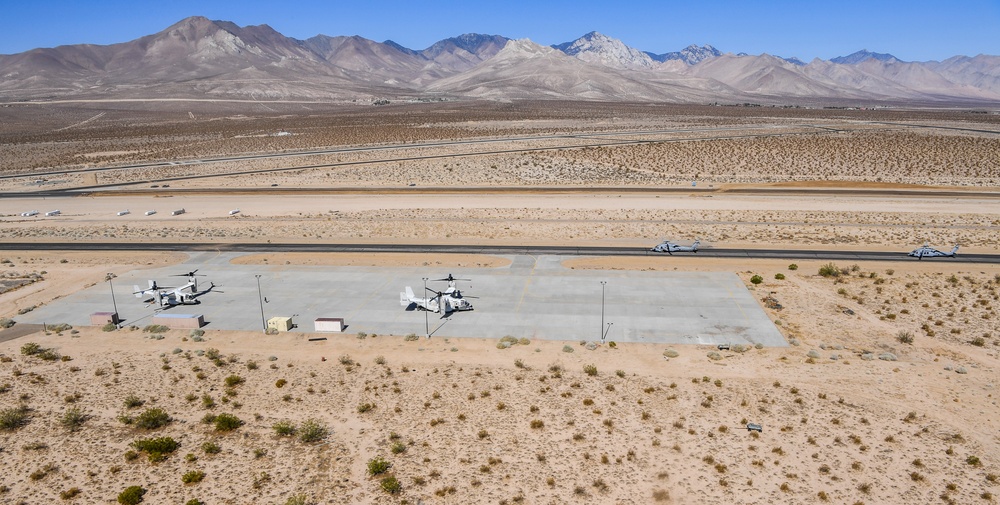 Helicopter Sea Combat Squadron (HSC) 4 Conducts Air Delivered Ground Refueling (ADGR) Evolution with Navy CMV-22B Osprey